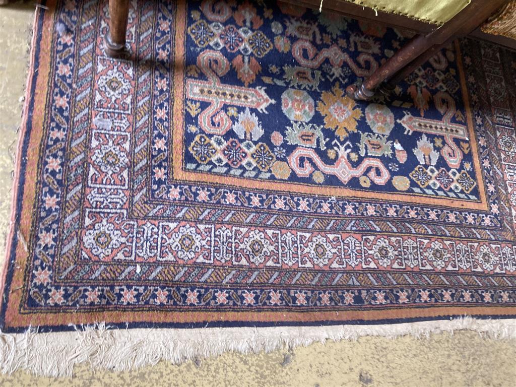A Caucasian blue ground rug, 200 x 132cm